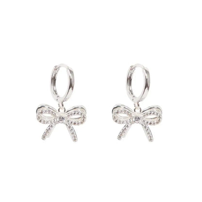 Silver Bow Huggie Earrings