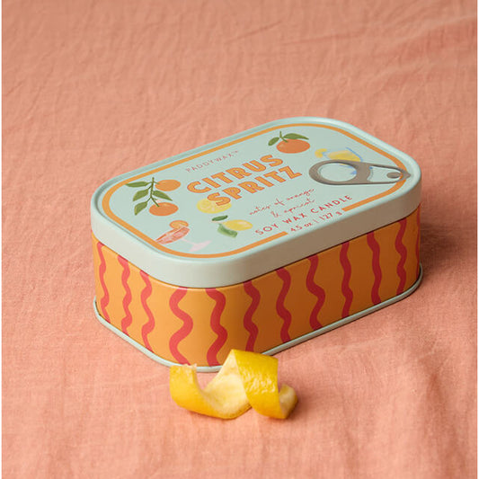 Decorative tin with citrus design on a pink background